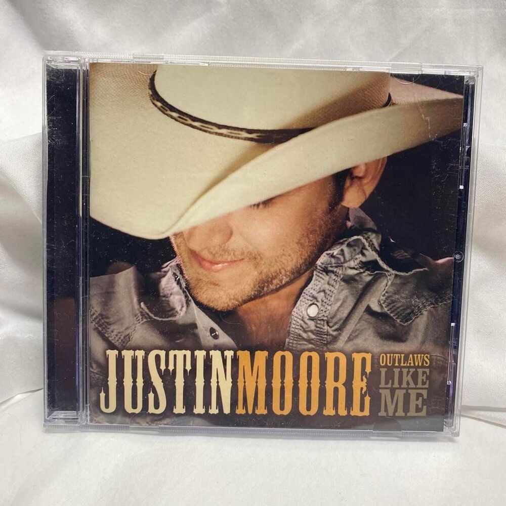 * Justin Moore Outlaws Like Me country music CD